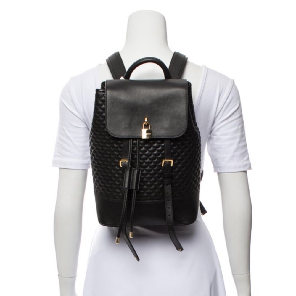 Mint condition BUSCEMI Black Leather Luck Quilted Backpack Gold